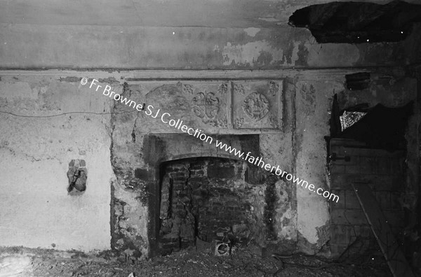 THE CASTLE  DAMAGED FIREPLACE IN WEST ROOM OF GROUND FLOOR